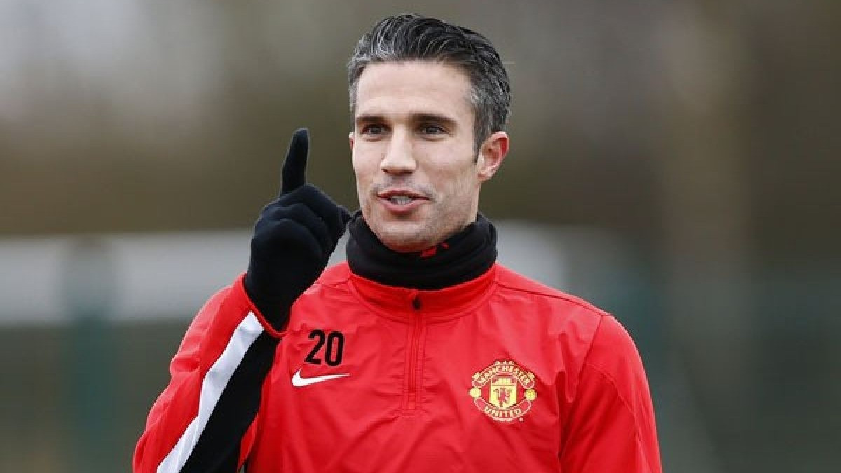 Robin Van Persie hijrah dari Arsenal ke Manchester United