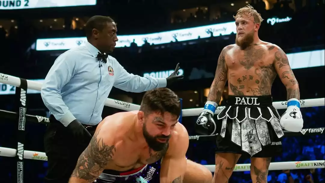 Jake Paul berhasil mengalahkan mantan petarung UFC Mike Perry di dalam duel tinju.