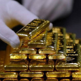 Emas Naik 12,4 Dolar AS Dipicu  Solvabilitas Kelompok Properti China Evergrande