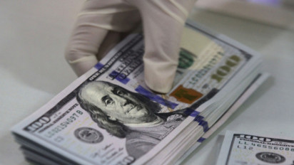 Rupiah Ditutup Menguat Seiring Kekhawatiran Lambatnya Pemulihan Ekonomi