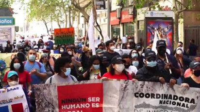 Tuntut Perlakuan Layak Kepada Imigran, Ratusan Warga Chili Demo di Pusat Kota