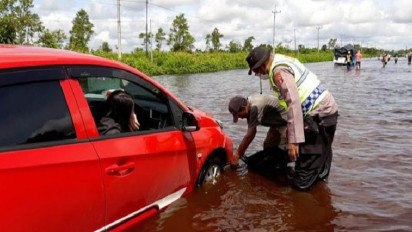 Waspada Banjir jalur Trans Kalimantan di sepanjang Desa Bukit Rawi