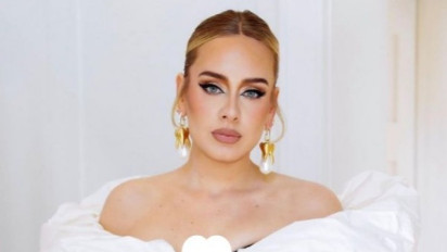 Spotify Hapus Tombol Putar Acak Atas Permintaan Adele