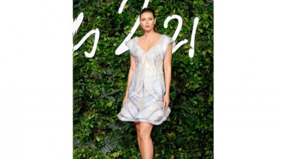 Petenis Maria Sharapova Kenakan Gaun dari Botol Air Mineral