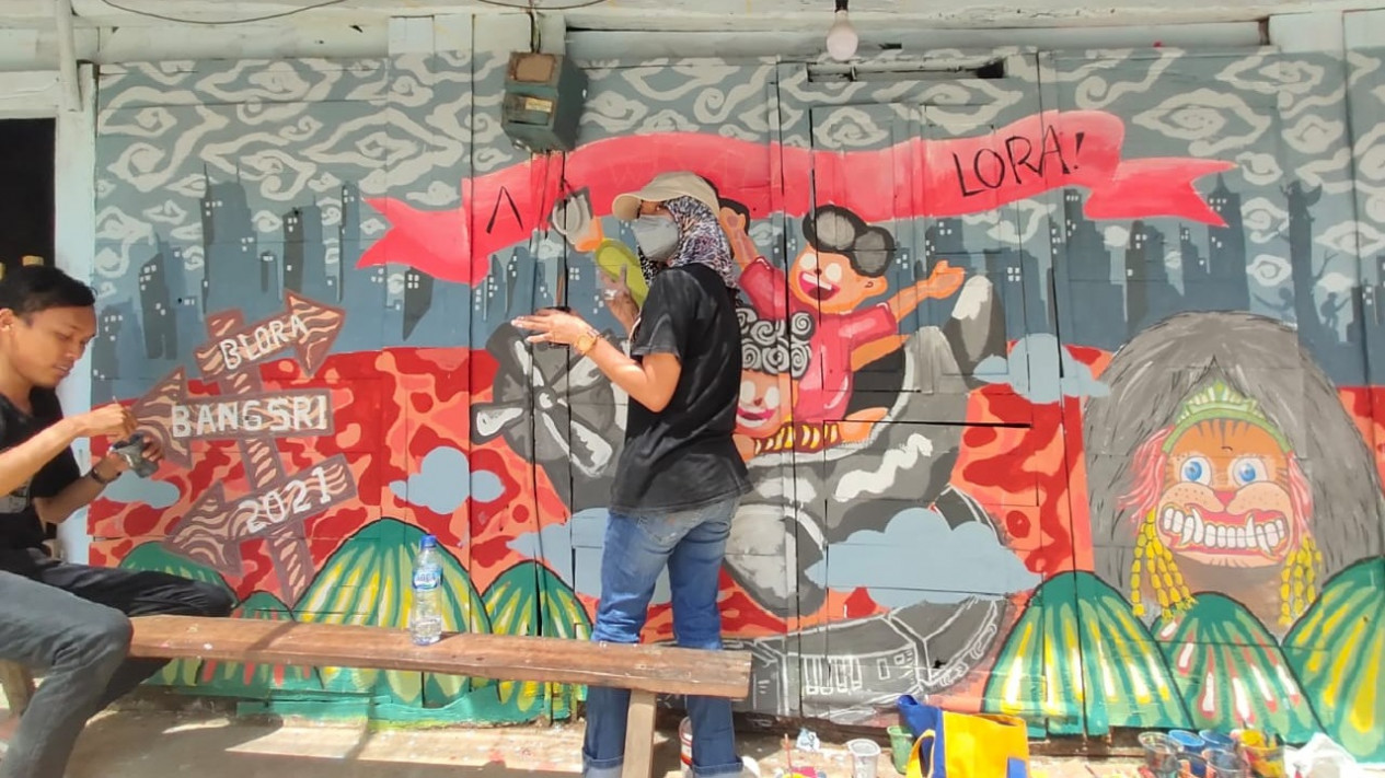 Bangkit di Tengah Pandemi, Kampung Pelangi Blora Gelar Even Mural Nasional 
            - galeri foto