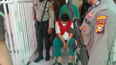 Sering Mangkir, Bos Investasi Bodong Dikawal Polisi ke Persidangan Â 