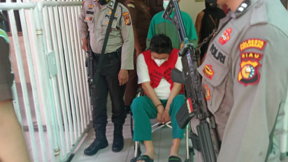 Sering Mangkir, Bos Investasi Bodong Dikawal Polisi ke Persidangan  