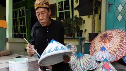Caping Lukis, Mengangkat Harkat Si Topi Tradisional