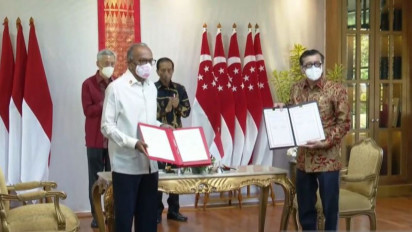 Menkumham Tandatangani Perjanjian Ekstradisi Indonesia dan Singapura