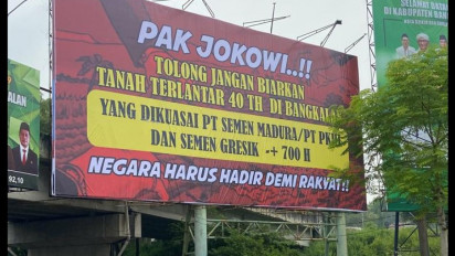 Baliho Bertuliskan Minta Tolong kepada Presiden Jokowi atas Tanah Terlantar, Bertebaran di Akses Suramadu