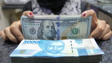 Rupiah Ditutup Melemah ke Posisi Rp14.348 per Dolar AS