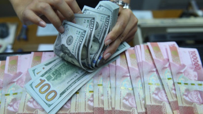 Rupiah Ditutup Melemah 0,02 Persen ke Posisi Rp14.362 per Dolar AS