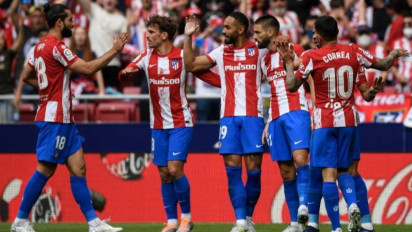 Carrasco Bawa 10 Pemain Atletico Taklukkan Espanyol 2-1