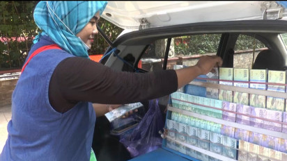 Jelang Lebaran, Jasa Penukaran Uang Baru Menjamur di Jepara