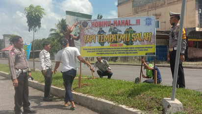 Cegah Aksi Balap Liar Pelajar, Polisi Pasang Spanduk Imbauan di Areal Stadion