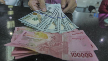 Rupiah Ditutup Melemah ke Posisi Rp14.492 per Dolar AS