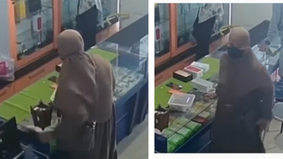 Viral Video Seorang Ibu-ibu mencuri Handphone yang Tergeletak di Counter HP, Aksinya Terekam CCTV