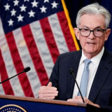 Wall Street Bergejolak Usai The Fed Pangkas Suku Bunga, Dow Tembus Rekor Baru