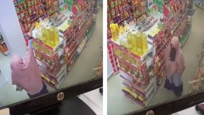 Viral Seorang Wanita Mencuri Minyak Goreng di Minimarket Sembunyikan Dibalik Hijab, Aksinya Terekam CCTV
