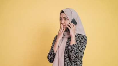 Bagaimana Hukum Seorang Istri yang Menceritakan Masalah Pernikahan ke Pria Lain?