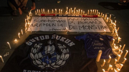 Sesali Tragedi Kanjuruhan, Aremania dan Bonek Suarakan Perdamaian
