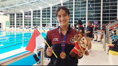 Masniari Wolf, Si Cantik Peraih Emas SEA Games 2021, Sukses Pertajam Rekor