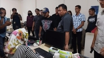 Ditkrimsus Polda Sulut dan Tim Siber Polda Metro Jaya Grebek Kantor Pusat Pinjaman Online Ilegal di Manado