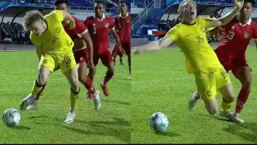 Aksi diving Fergus Tierney