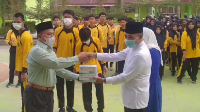 Dampak Kabut Asap, Puluhan Ribu Masker di Distribusikan ke Sekolah
