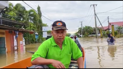 Banjir Melanda Malinau, Babinsa Himbau Warga Terus Waspada