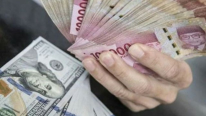 Rupiah Melemah di Tengah Pasar Nantikan Kebijakan Suku Bunga BI