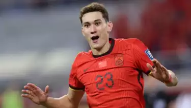 Pemain China asal etnis Muslim Uighur, Behram Abduweli mencetak gol ke gawang Timnas Indonesia