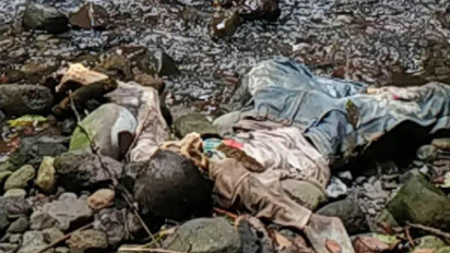 Kerangka Mayat Memakai Kaus Putih Bertuliskan CHICAGO BULL Ditemukan Warga di Bawah Aliran Air Terjun Seling Wagir