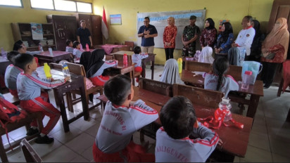 Kantor Imigrasi Madiun Bagikan 300 Paket Makanan Bergizi Gratis untuk Siswa Sekolah Dasar