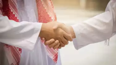 Ilustrasi salaman dan ucapan Idul Fitri