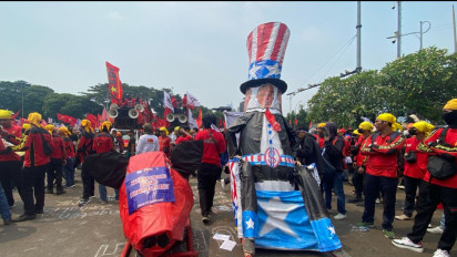 Ketua KASBI Ungkap Alasan Arak Ogoh-ogoh Donald Trump di Aksi May Day