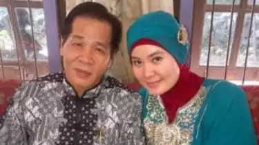 Almarhum Anton Medan dan istri, Erisya Hapsari