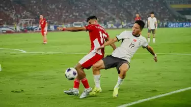 Ricky Kambuaya saat dilanggar Yang Zexiang