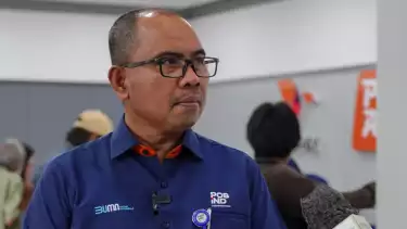 Haris, Direktus Bisnis Jasa Keuangan.