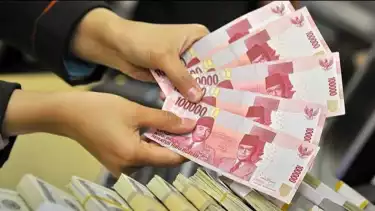 Ilustrasi uang rupiah hasil rezeki setelah kerja seharian