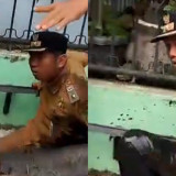 Didorong Warganya ke Parit, Lurah di Medan Berlumur Lumpur hingga Masuk Rumah Sakit 