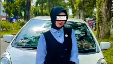 Erni Yuniati dosen cantik yang dibunuh oleh oknum polisi Bripda Waldi (22) di Jambi