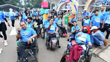 Penyandang disabilitas ikut ramaikan gelaran EcoRun Fest 2025 Pertamina, di Istora Senayan, Jakarta pada Minggu (23/11/2025).