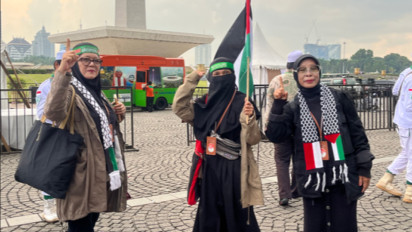 Seorang Wanita Asal Bogor Bawa Ribuan Tasbih saat Reuni Akbar 212 di Monas, Ternyata Hasil dari Ini