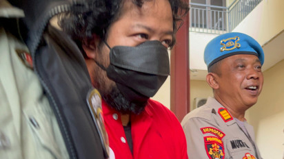 Jadi Tersangka Kasus Kebakaran, Ini Tampang Bos Terra Drone Berbaju Tahanan