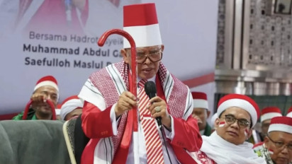 Abah Aos Haramkan Peci Hitam, Wajibkan Pemimpin Pakai Peci Merah Putih