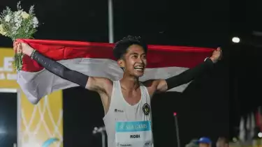 Robi Syianturi, atlet Indonesia yang raih emas SEA Games 2025 di cabor marathon