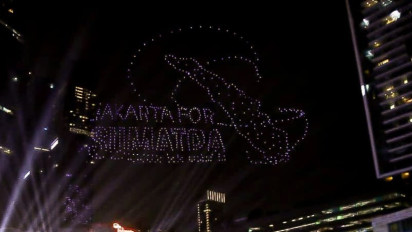 Berita Foto: Warga Jakarta Rayakan Tahun Baru 2026 di Bundaran HI