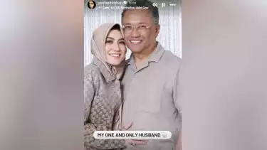 Pengusaha Malaysia Vie Shantie Khan dan suaminya