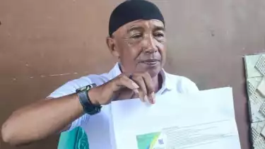 Suami almarhumah, M. Rusmi.